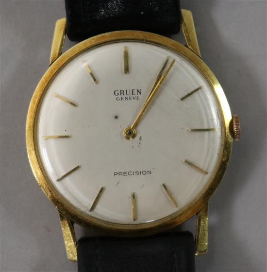 A gentlemans gold Gruen precision manual wind wrist watch.